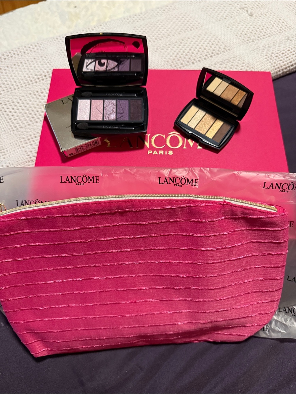Lancôme eye shadow palettes, Lancôme cosmetic bag and box.
